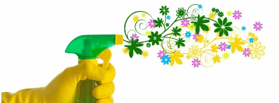 A hand in a rubber glove spraying flowers out of a bottle
