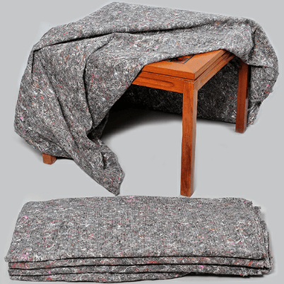 A table protected by a removal blanket.